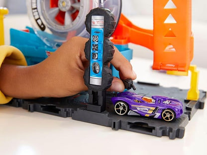 Hot Wheels City Super Twist Tire Shop™ Playset, Spin The Key to Make Cars Travel Through The Tires, Includes 1 Hot Wheels® Car