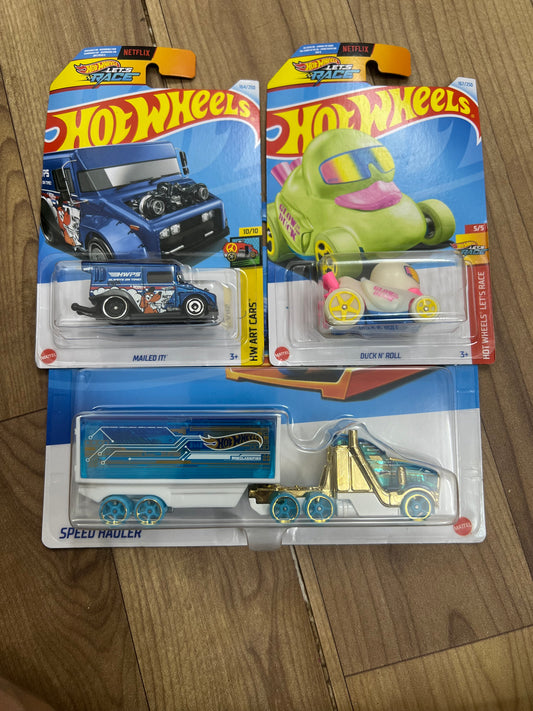Speed Hauler and Two Cars